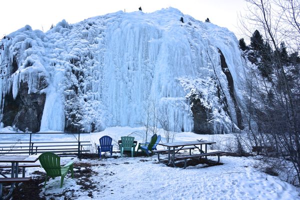 Picnic Tables provide a rest area beneath the icy cliffs. 