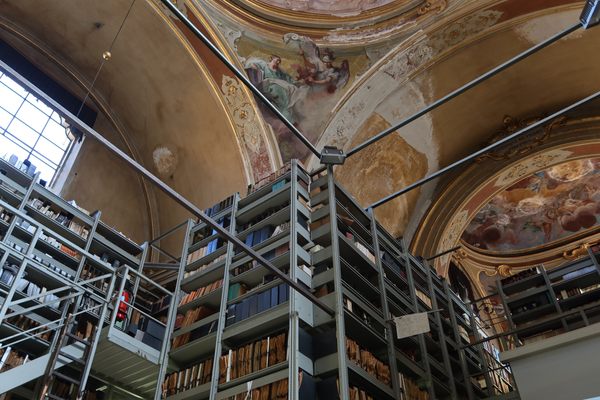 Metal shelves reach the high heavens