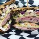 Triple decker rye, with boarshead ham, Swiss, coleslaw and Russian dressing. 