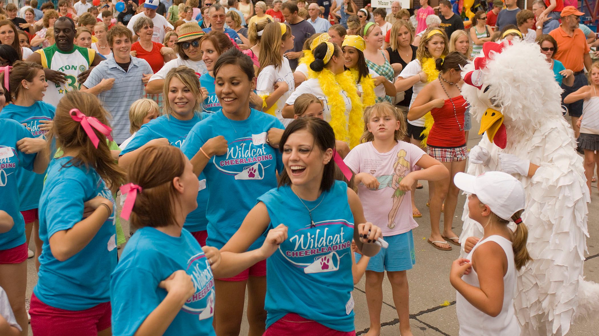 Revelers performing their best Chicken Dance at Nebraska’s Wayne Chicken Show.